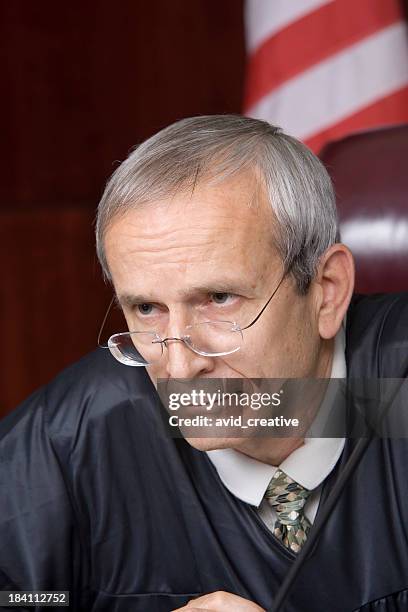 us judicial system-stern judge portrait - judge robe stock pictures, royalty-free photos & images