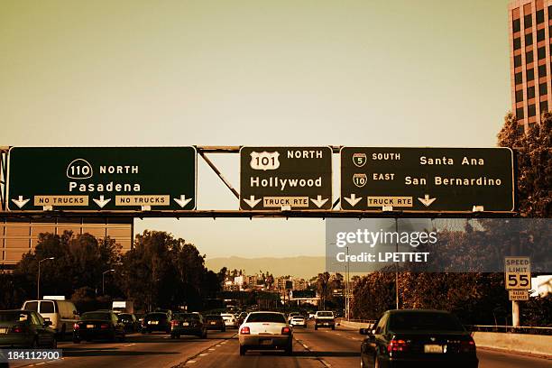 los angeles freeway exits on a sunny day. - hollywood sign stock pictures, royalty-free photos & images