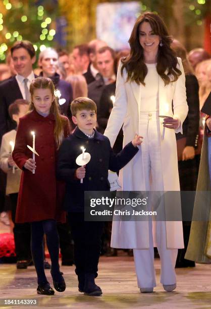 Catherine, Princess of Wales, Princess Charlotte of Wales and Prince Louis of Wales attend The "Together At Christmas" Carol Service at Westminster...