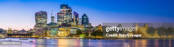 london city financial district skyscrapers glittering at sunset thames panorama - london bridge night stock pictures, royalty-free photos & images