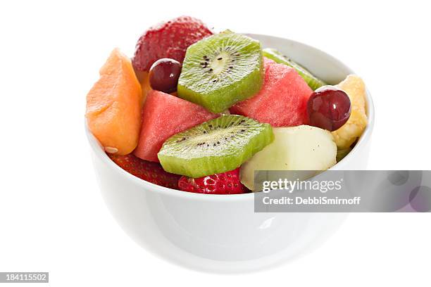 fruit salad in a bowl - fruit salad stock pictures, royalty-free photos & images