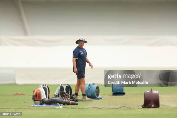 Groundstaff attend to blowers attempting to dry the wicket during a delay to the start of play due to an overnight storm during day four of the Tour...