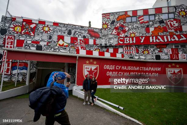 This photograph taken on December 11 shows murals at the entrance of the infamous tunnel of the Rajko Mitic Stadium in Belgrade, two days before the...