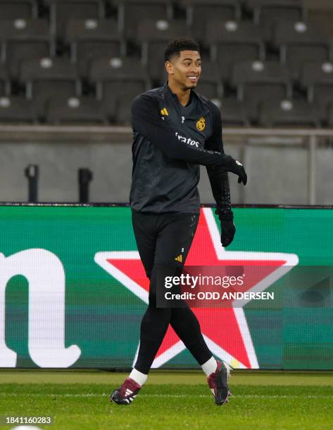 Real Madrid's English midfielder Jude Bellingham attends a training session in Berlin on December 11 on the eve of the UEFA Champions League Group C...