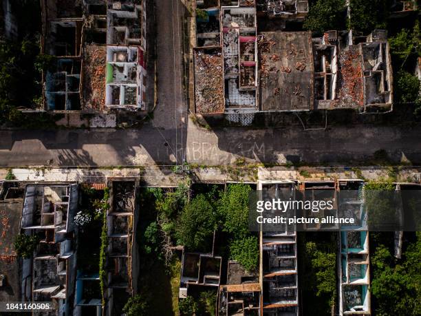 December 2023, Brazil, Maceio: "Fora Braskem" stands on a street next to houses in the Pinheiro district, which were evacuated due to the risk of a...