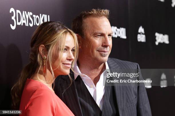 Christine Baumgartner and Kevin Costner attend Relativity Media's Premiere of '3 Days to Kill' at the Arclight Theatre sponsored by Evian, on...