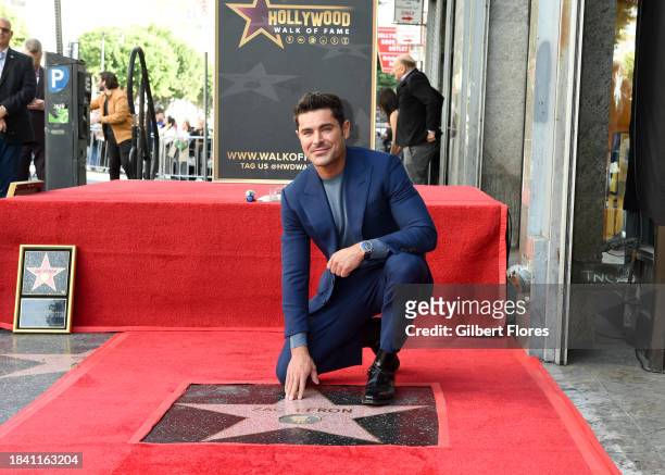 Zac Efron at the star ceremony where Zac Efron is honored with a star on the Hollywood Walk of Fame on December 11, 2023 in Los Angeles, California.