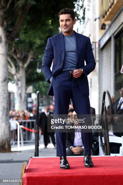Actor Zac Efron poses attends his Hollywood Walk of Fame ceremony in Hollywood, California, December 11, 2023.