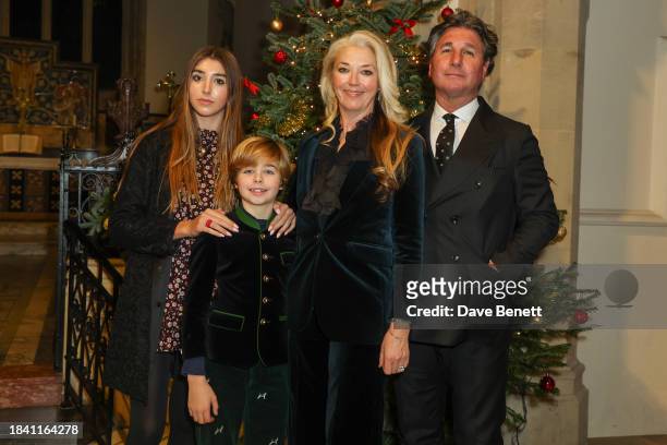 Violet Veroni, Vero Veroni, Tamara Beckwith and Giorgio Veroni attend The Lady Garden Foundation Carol Concert at Christ Church Kensington on...