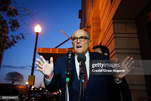 Rudy Giuliani, the former personal lawyer for former U.S. President Donald Trump, speaks to the press as he leaves the E. Barrett Prettyman U.S....