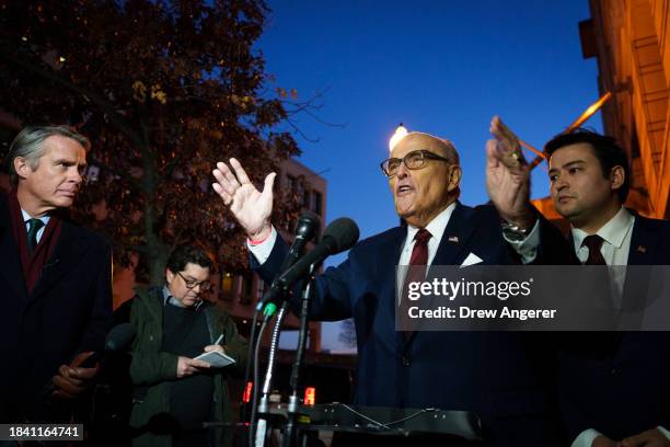 Rudy Giuliani, the former personal lawyer for former U.S. President Donald Trump, speaks to the press as he leaves the E. Barrett Prettyman U.S....