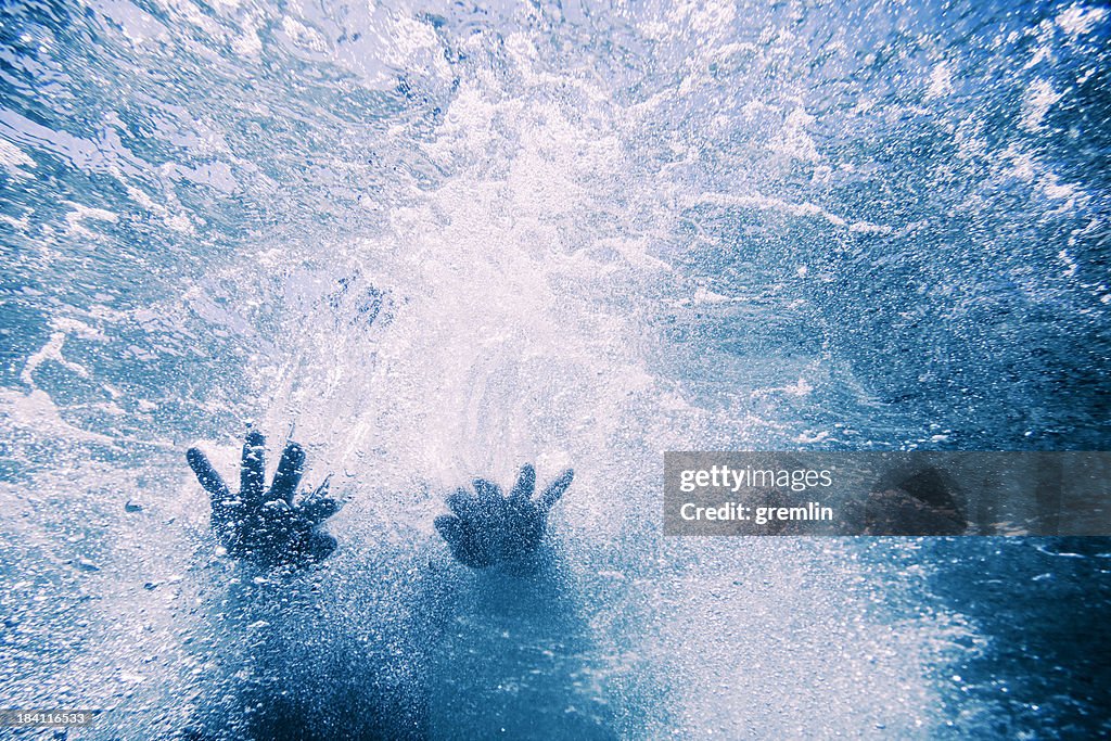 Underwater shot of a woman in the sea