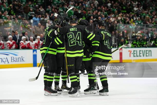 Miro Heiskanen and the Dallas Stars celebrates a goal against the Detroit Red Wings at the American Airlines Center on December 11, 2023 in Dallas,...