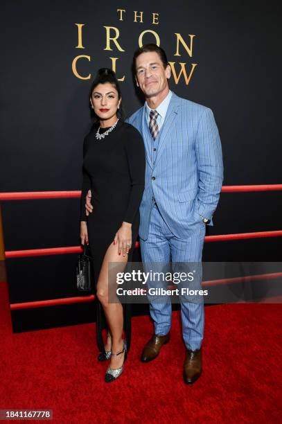 Shay Shariatzadeh and John Cena at the Los Angeles premiere of "The Iron Claw" held at DGA Theater on December 11, 2023 in Los Angeles, California.