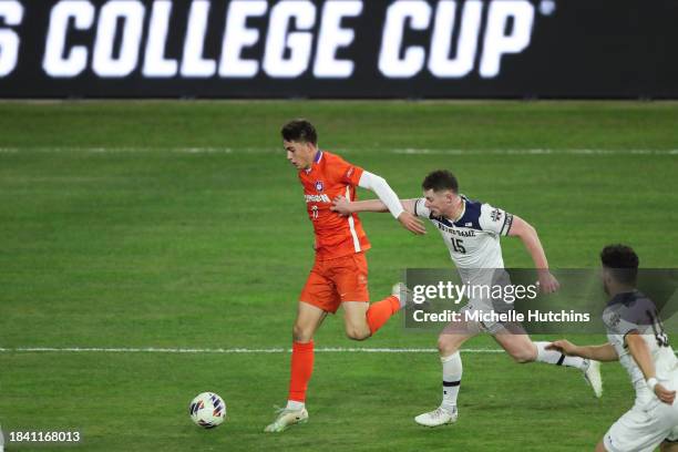 Tyler Trimnal of the Clemson Tigers and Paddy Burns of the Notre Dame Fighting Irish battle for the ball during the Division I Men's Soccer...