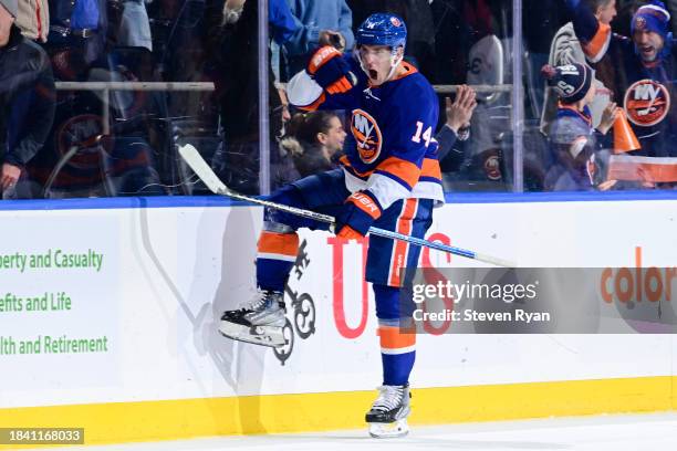 Bo Horvat of the New York Islanders celebrates after scoring the game-winning goal in overtime against the Toronto Maple Leafs at UBS Arena on...