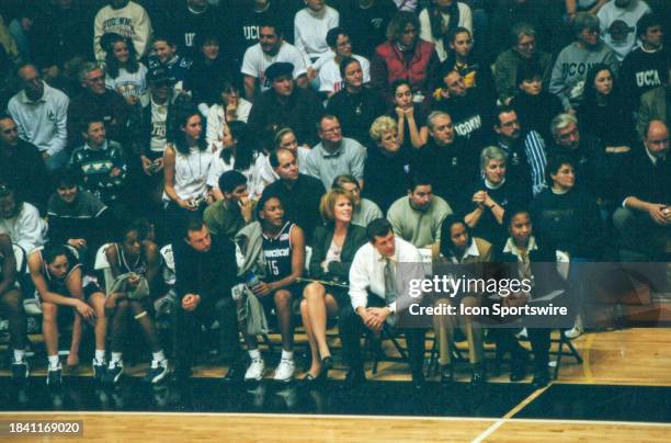 UConn Huskies assistant coaches Jamelle Elliott and Tonya Cardoza, UConn Huskies head coach Geno Auriemma, UConn Huskies associate head coach Chris...