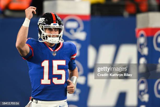 Tommy DeVito of the New York Giants runs onto the field prior to the start of the game against the Green Bay Packers at MetLife Stadium on December...