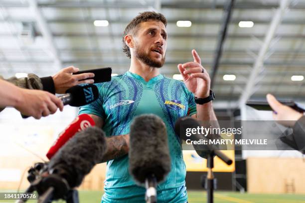 Hurricanes' scrum-half TJ Perenara speaks to media during a training session at the New Zealand Campus of Innovation and Sport in Upper Hutt on...