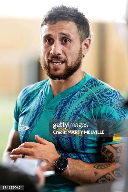 Hurricanes' scrum-half TJ Perenara speaks to media during a training session at the New Zealand Campus of Innovation and Sport in Upper Hutt on...