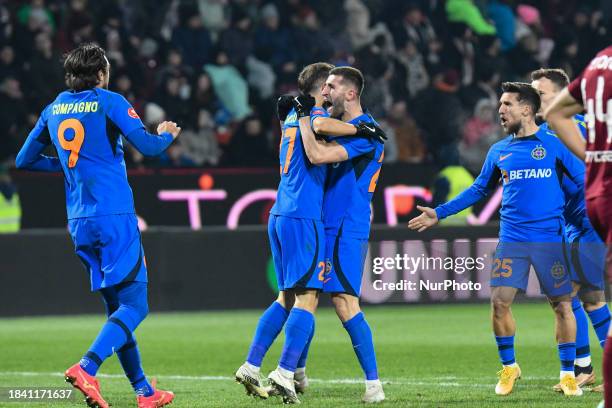 Players from FCSB are celebrating during the match between CFR Cluj and FCSB at Dr. Constantin Radulescu Stadium in Cluj-Napoca, Romania, on December...