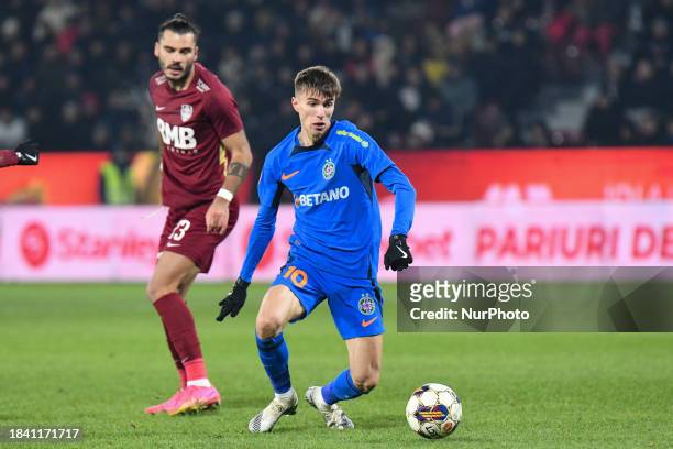 Octavian Popescu is in action during the match between CFR Cluj and FCSB at Dr. Constantin Radulescu Stadium in Cluj-Napoca, Romania, on December 10,...