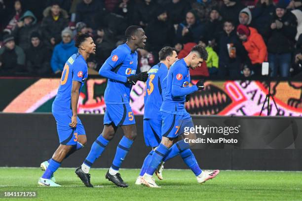 Players from FCSB are celebrating during the match between CFR Cluj and FCSB at Dr. Constantin Radulescu Stadium in Cluj-Napoca, Romania, on December...