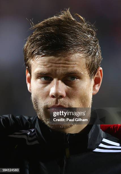 Alexander Kokorin of Russia looks on during the national anthem during the FIFA 2014 World Cup Qualifier Group F match between Luxembourg and Russia...
