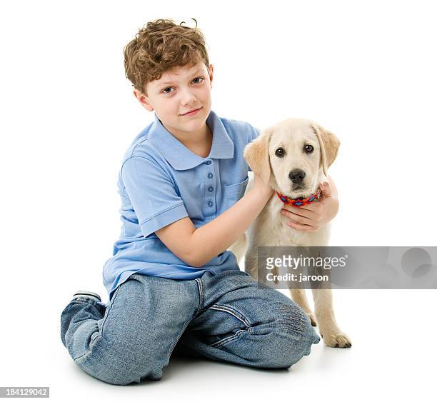 eight years old boy wit his dog - 8 9 years stock pictures, royalty-free photos & images