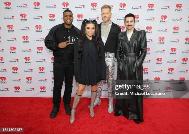 Matt Sallee, Kirstin Maldonado, Scott Hoying, and Mitch Grassi of Pentatonix attend iHeartRadio z100's Jingle Ball 2023 at Madison Square Garden on...