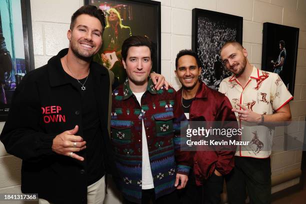 James Maslow, Logan Henderson, Carlos PenaVega and Kendall Schmidt of Big Time Rush attend iHeartRadio z100's Jingle Ball 2023 Presented By Capital...