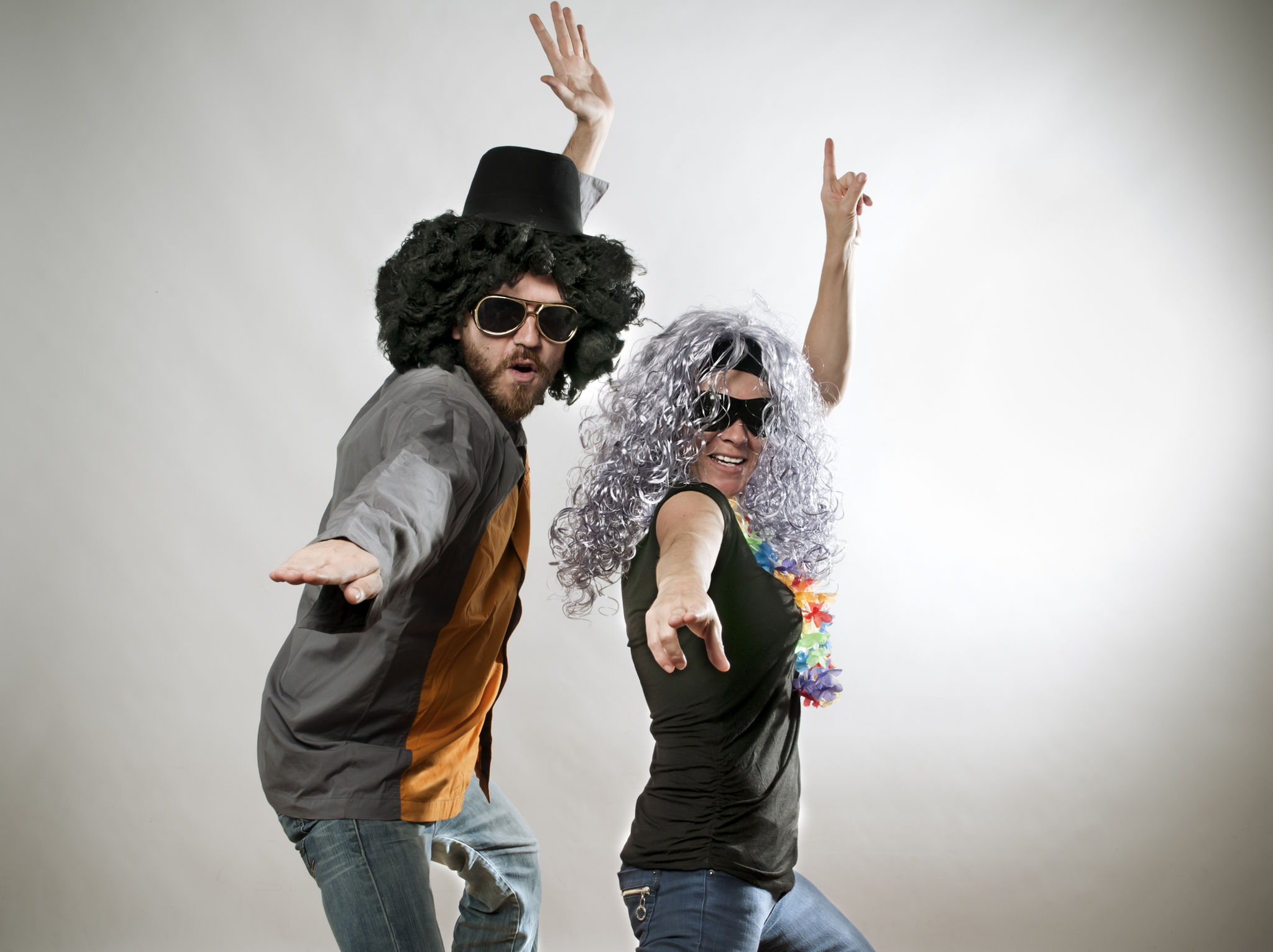 people wearing wigs singing