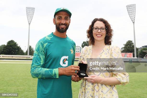 Labor member for Canberra Alicia Payne poses with player of the match Shan Masood of Pakistan during day four of the Tour match between PMs XI and...