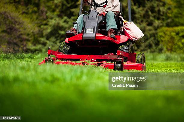 man mowing lawn - lawn tractor stock pictures, royalty-free photos & images