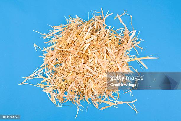 straw pile on blue - straw stock pictures, royalty-free photos & images