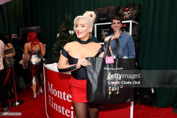 Joelle James visits the Montefiore Einstein gift suite during iHeartRadio z100's Jingle Ball 2023 Presented By Capital One at Madison Square Garden...