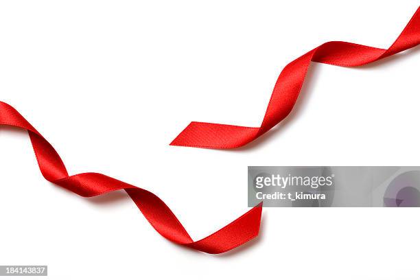 fiocco rosso regalo - ribbon foto e immagini stock