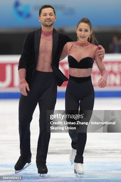 Lilah Fear and Lewis Gibson of Great Britain react after competes in the Ice Dance Rhythm Dance during day two of the ISU Grand Prix of Figure...