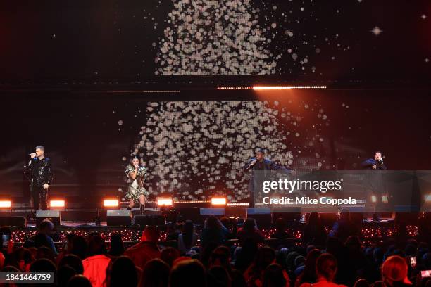 Scott Hoying, Kirstin Maldonado, Matt Sallee and Mitch Grassi of Pentatonix perform onstage during iHeartRadio z100's Jingle Ball 2023 Presented By...