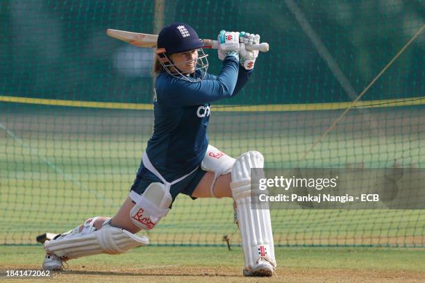 Tammy Beaumont of England plays a shot during a net session at DY Patil Stadium on December 12, 2023 in Navi Mumbai, India.