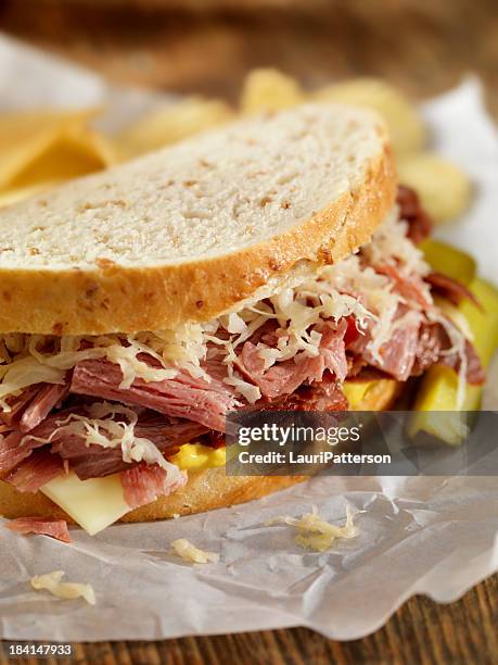 pastrami and swiss sandwich - reiben stock pictures, royalty-free photos & images