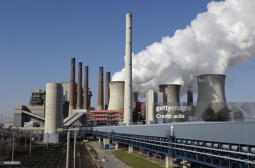 Smoke stacks and cooling towers of a power plant