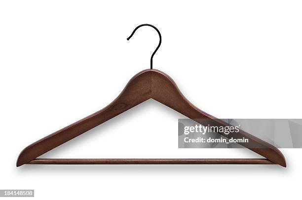 elegant, wooden, dark brown clothes hanger isolated on white - kledinghanger stockfoto's en -beelden