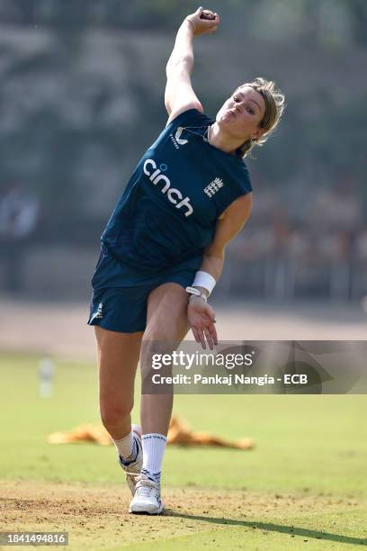 Lauren Bell of England delivers a ball during a net session at DY Patil Stadium on December 12, 2023 in Navi Mumbai, India.