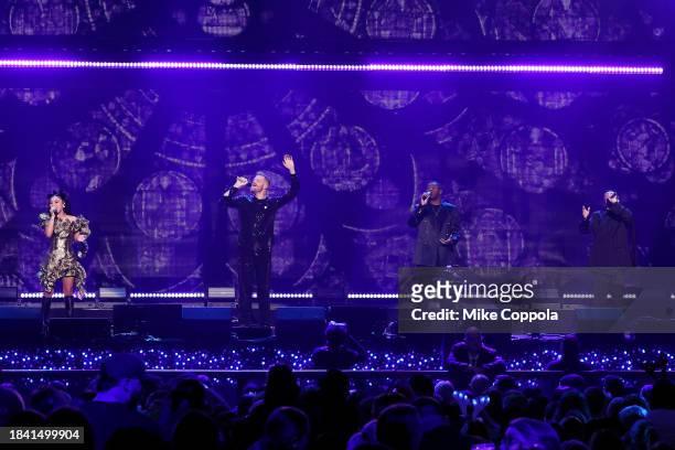 Kirstin Maldonado, Scott Hoying, Matt Sallee and Mitch Grassi of Pentatonix perform onstage during iHeartRadio z100's Jingle Ball 2023 Presented By...