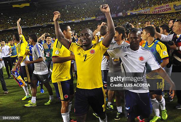 Colombia's defender Pablo Armero celebrates after qualifying for the Brazil 2014 FIFA World Cup after a 3-3 tie with Chile in a South American...