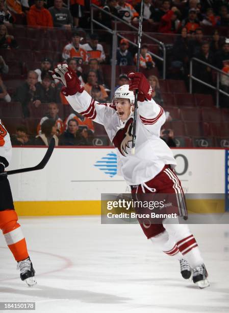 Tim Kennedy of the Phoenix Coyotes celebrates a goal by Rob Klinkhammer during the first period against the Philadelphia Flyers at the Wells Fargo...