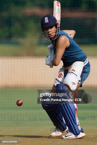 Sophia Dunkley of England plays a shot during a net session at DY Patil Stadium on December 12, 2023 in Navi Mumbai, India.