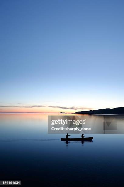 xxxl twilight canoeing - lake superior stock pictures, royalty-free photos & images