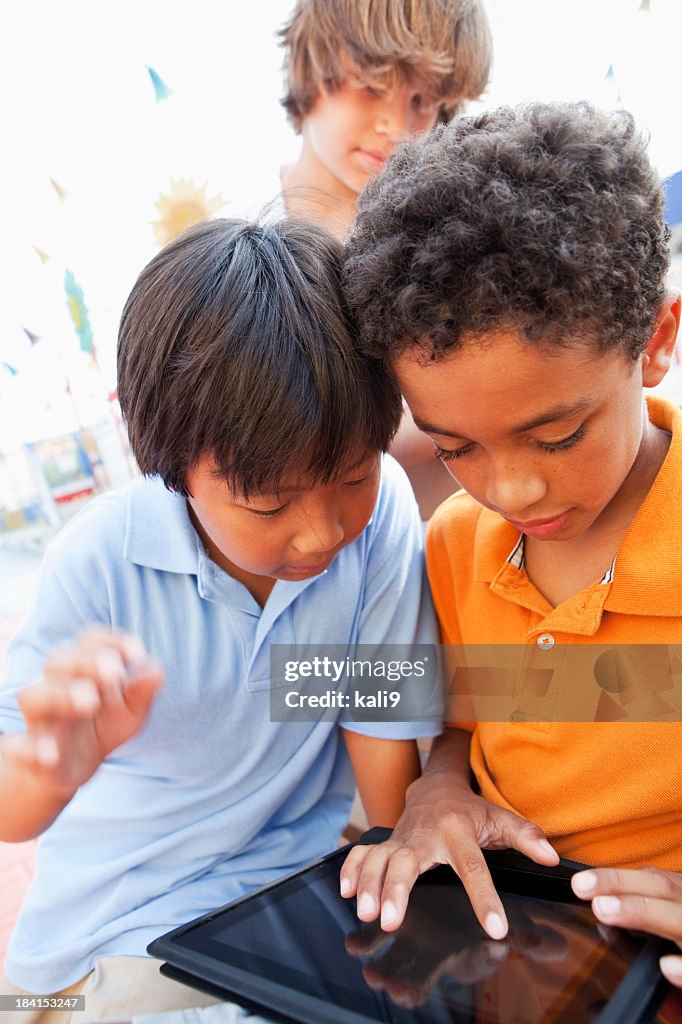 Boys using tablet PC